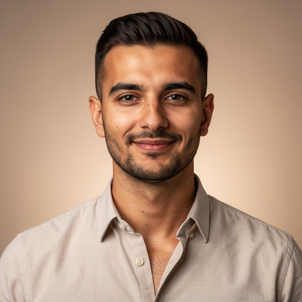 Portrait of a young man with short hair, camera operator